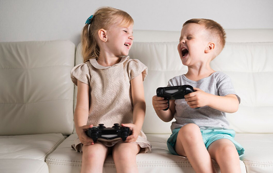 little-siblings-playing-digital-games-with-joystick_23-2148301552
